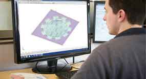 applications specialist working on CAD model