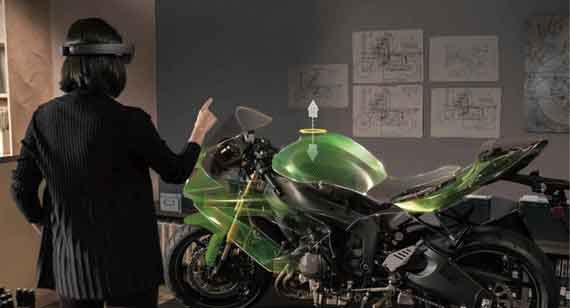 a designer uses augmented reality on motorcycle