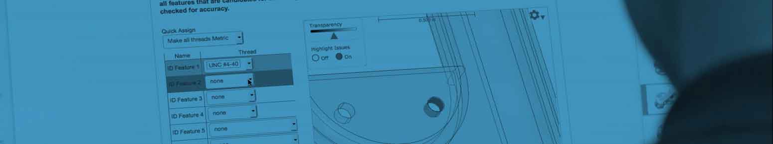 applications engineer examines a part