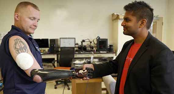 U.S. Army veteran Garrett Anderson used the system integrated with his prosthetic arm to determine the strength of his grip. Photo courtesy: northwestern.edu